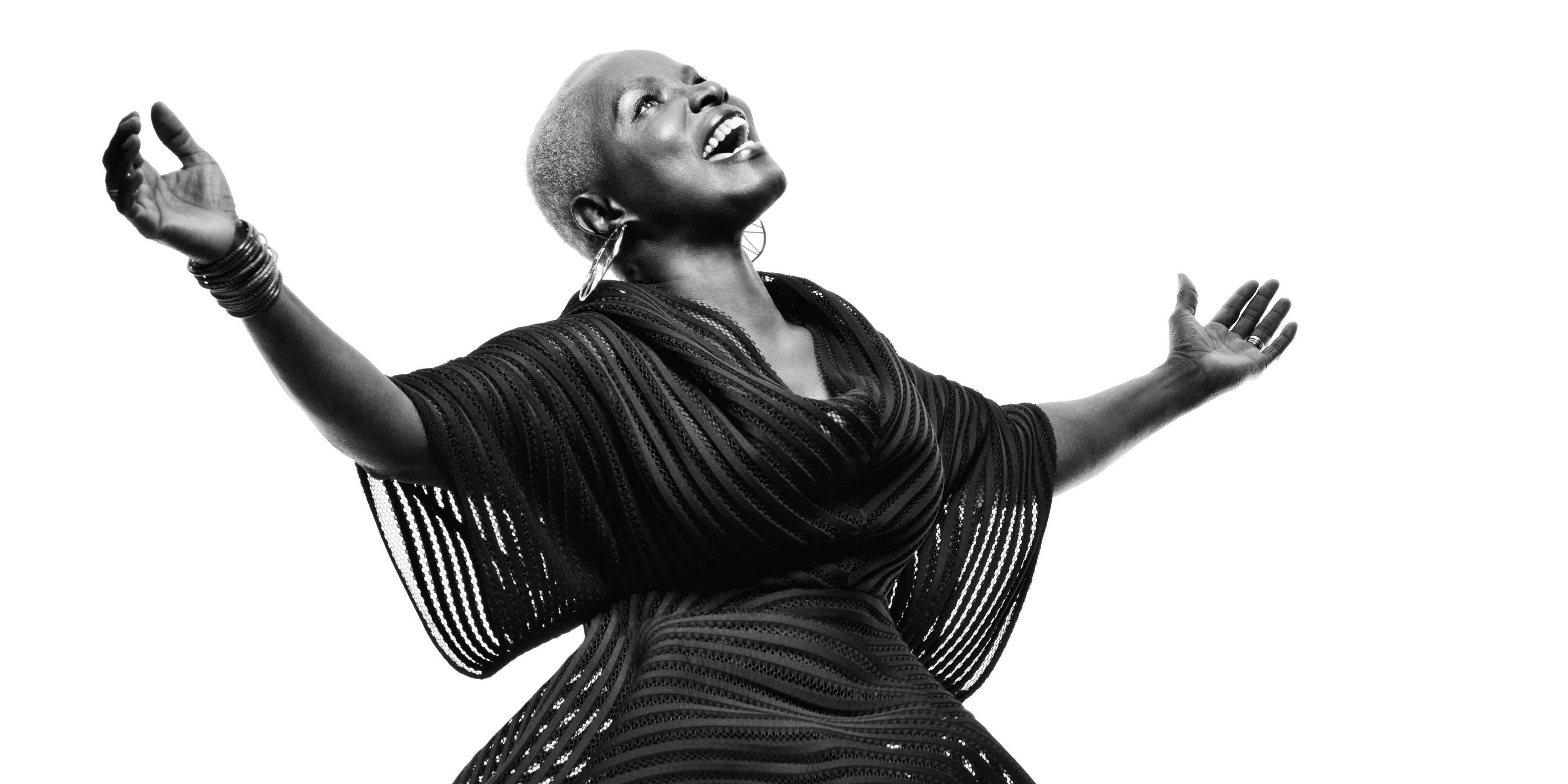 angelique kidjo (music) mesmerizing performance live concert experience museum exhibition dual screen desktop