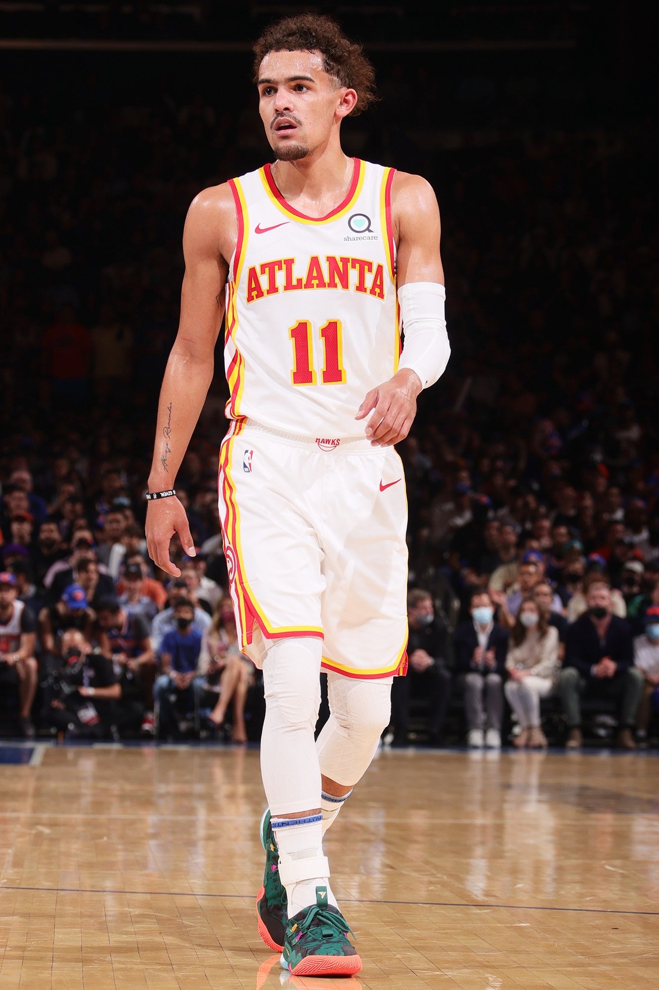 trae young disruptive fan knicks ban player's safety hd phone